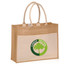 A jute tote bag featuring handles, a cream body, and a green logo on the front.