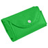 A foldable non-woven shopping bag in vibrant green, neatly rolled with a snap closure.