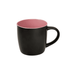 A coffee mug with a black exterior and pink interior, featuring a handle and a smooth finish. It has a logo.