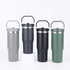 A drink bottle featuring four vacuum tumblers in grey, dark grey, black, and green with metal handles and a logo.