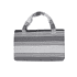 A grey and white striped foldable beach towel bag with two handles and a simple logo.