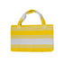 A foldable beach towel bag in yellow and white stripes, featuring sturdy handles and a simple design.