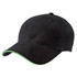 A black cap with a contrasting green peak and an adjustable strap, featuring ventilation holes and a logo.