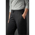 Black women's track pants with an elastic waistband and pockets, styled with a grey top.