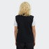 A black women's vest with a simple design, featuring a back view of a person wearing it.