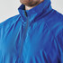 A blue men's 1/4 zip anorak jacket with a high collar and a zipper, featuring a logo on the front.