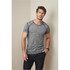 A grey marled men's T-shirt with contrasting seams, featuring a logo on the chest, paired with black trousers.