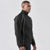 A men's black training jacket with white accent lines, featuring a high collar and zip fastening. It has a logo on the sleeve.