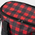 A red and black checkered cooler bag with a zip closure and a black handle. It features a logo on the side.