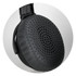 A close-up of a black headphone earcup featuring a textured surface and a circular design pattern.