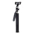 A black selfie stick tripod with a phone holder and adjustable settings for different angles.