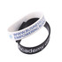 A pair of rectangular silicone wristbands in white and black, featuring various printed text and logos.