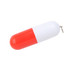 A pill-shaped flash drive in red and white, featuring a keychain attachment. It has a smooth glossy finish.