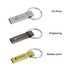 A collection of three Titan Flash Drives in silver, grey, and gold, each with a keyring attachment.
