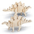 A wooden model of a Stegosaurus in a natural finish, featuring distinctive spiky plates along its back.