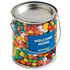 A large PVC bucket filled with colourful chewy fruits in various shades, featuring a handle and a branding label.