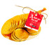 A mesh bag filled with shiny gold chocolate coins, featuring a tag and tied with a golden ribbon.
