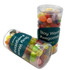 A transparent PET tube containing colourful Jelly Belly jelly beans, with a visible branding label.