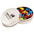 A silver tin filled with colourful M&Ms, featuring a logo on the lid.
