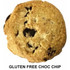A gluten-free choc chip biscuit, golden brown with dark chocolate pieces, presented against a white background.