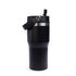 A drink tumbler in matte black with a silver accent and a black lid featuring a handle. It has a logo on the side.