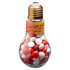A light bulb-shaped container filled with red and white chewy fruits, featuring a gold top and a label.