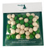 A sealed bag of chewy fruit balls in green and white, featuring a logo on the packaging.