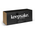 A black box with branding for a "Keepsake Herb Planter," featuring a minimalist design and a sleek appearance.