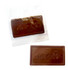 An embossed chocolate bar in dark brown, packaged in a clear wrapper, featuring a logo.