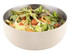 A salad bowl in cream colour, filled with mixed greens, tomatoes, and shredded carrots, with a silver interior.