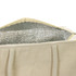 A cream-coloured cooler tote with a silver insulated interior and sturdy handles. It has a zippered opening.