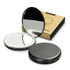 A compact mirror with a sleek black exterior, partially opened to reveal a reflective interior, beside its packaging.
