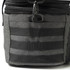 A grey expanding cooler with black webbing and a zipper closure. Features a durable fabric and sturdy construction.