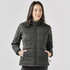 A women's puffer jacket in dark grey with a zip front, featuring side pockets and a high collar, with branding.