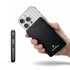 A power bank in black is held alongside a smartphone, showcasing its slim design and branding.