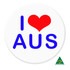 A 56mm button badge featuring a red heart and the text "I AUS" in blue on a white background, with a logo.