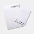 A4 notepad with 50 leaves, featuring lined pages and a logo. Predominantly white with a subtle design.