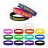 A variety of silicone wristbands in multiple colours, featuring debossed text and branding designs.