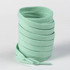 A spool of light mint green shoelaces, neatly coiled and ready for use. The product has a simple design.