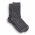 A pair of grey ribbed socks showcasing a soft texture and comfortable design. The product has a logo.