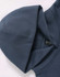 A navy blue oversized hoodie with a spacious hood and a label inside. The fabric appears soft and fleece-like.