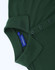 A green ladies' cotton/poly pique short-sleeve polo featuring a collar and button placket. It has a brand label.