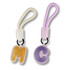 Two bag charms in pastel colours: one yellow 'M' and one purple 'C', each with a detachable strap.