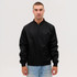 A black bomber jacket is displayed on a model, featuring a zip front and ribbed cuffs.
