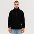 A black polar fleece full zip jacket displayed on a model, featuring a high collar and front zipper.