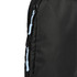 A black packing cube with blue zipper pulls, featuring a textured fabric surface and seamless design.