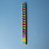 A colourful 30cm popper ruler with a vibrant design and multiple popping buttons along its length, featuring a logo.