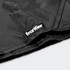 A black camping blanket with a logo tag, featuring textured fabric and a folded edge.