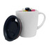 A white mug filled with colourful jelly beans, accompanied by a black lid.