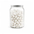 A clear jar filled with white jelly beans, showcasing a smooth and glossy finish.